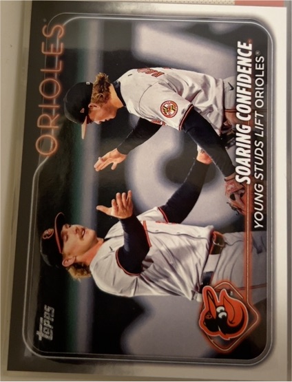 2024 Topps Update #US285 Soaring Confidence: Young Studs Lift Orioles Jackson Holliday / Gunnar Henderson — front