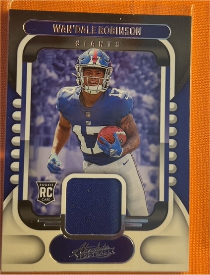2022 Panini Absolute Rookie Materials #ARM-?? Wan'Dale Robinson — front