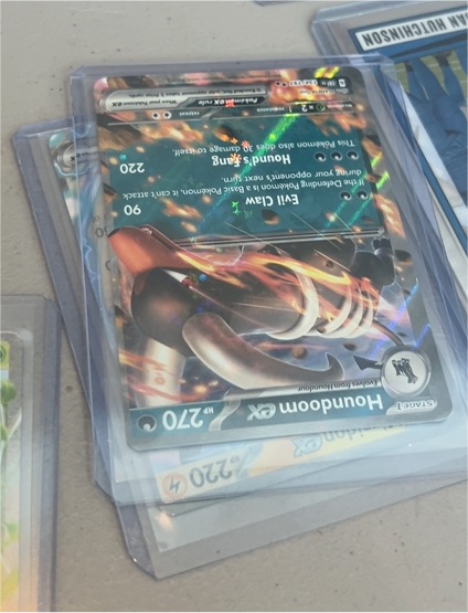 2023 Pokémon SV03: Obsidian Flames #134 Houndoom ex — front