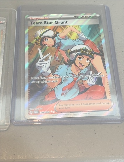 2023 Pokémon TCG Scarlet & Violet #242 Team Star Grunt — front
