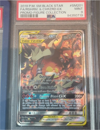 2019 Pokemon SM Black Star Promo #SM201 Reshiram & Charizard GX — front