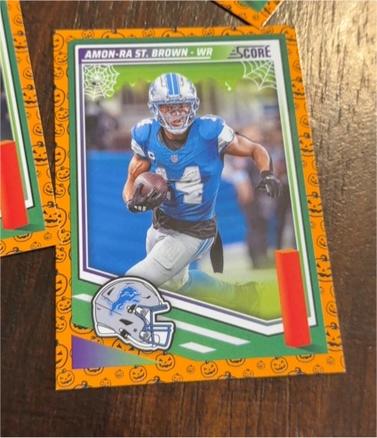 2025 Panini Score-A-Treat #142 Amon-Ra St. Brown — front