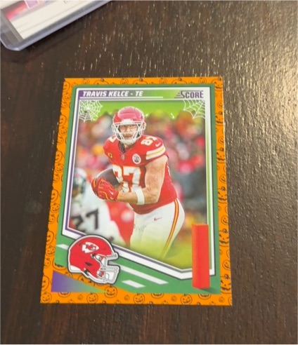 2025 Panini Score-A-Treat #136 Travis Kelce — front