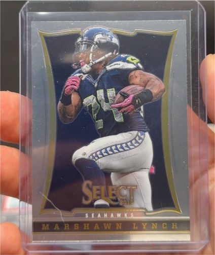 2013 Panini Select #94 Marshawn Lynch — front