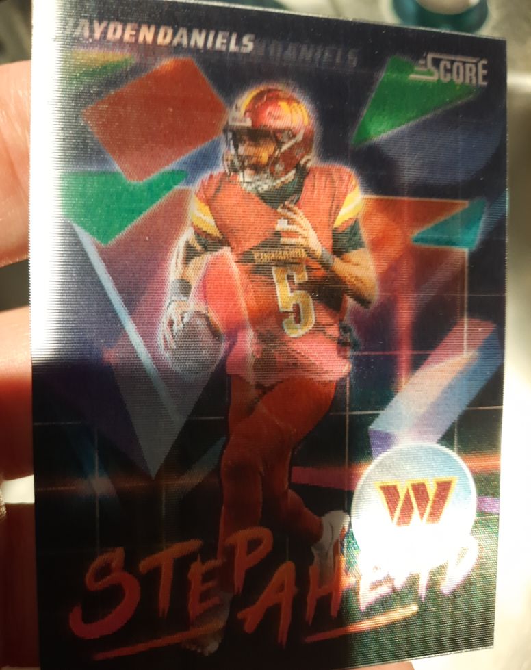 2025 Panini Score Step Ahead #Jayden Daniels — front