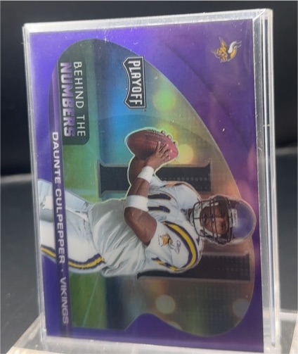 2021 Panini Playoff #BTN-DCU Daunte Culpepper Behind the Numbers Purple — front
