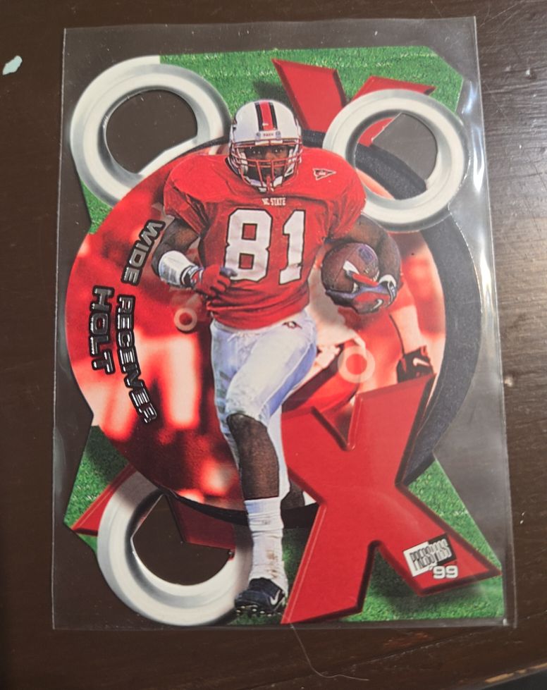 1999 Press Pass X's and O's #XO7 Torry Holt — front