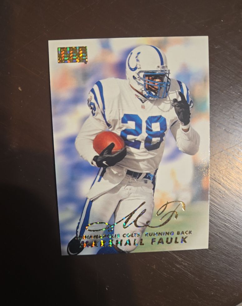 1998 Skybox Premium #77 Marshall Faulk — front