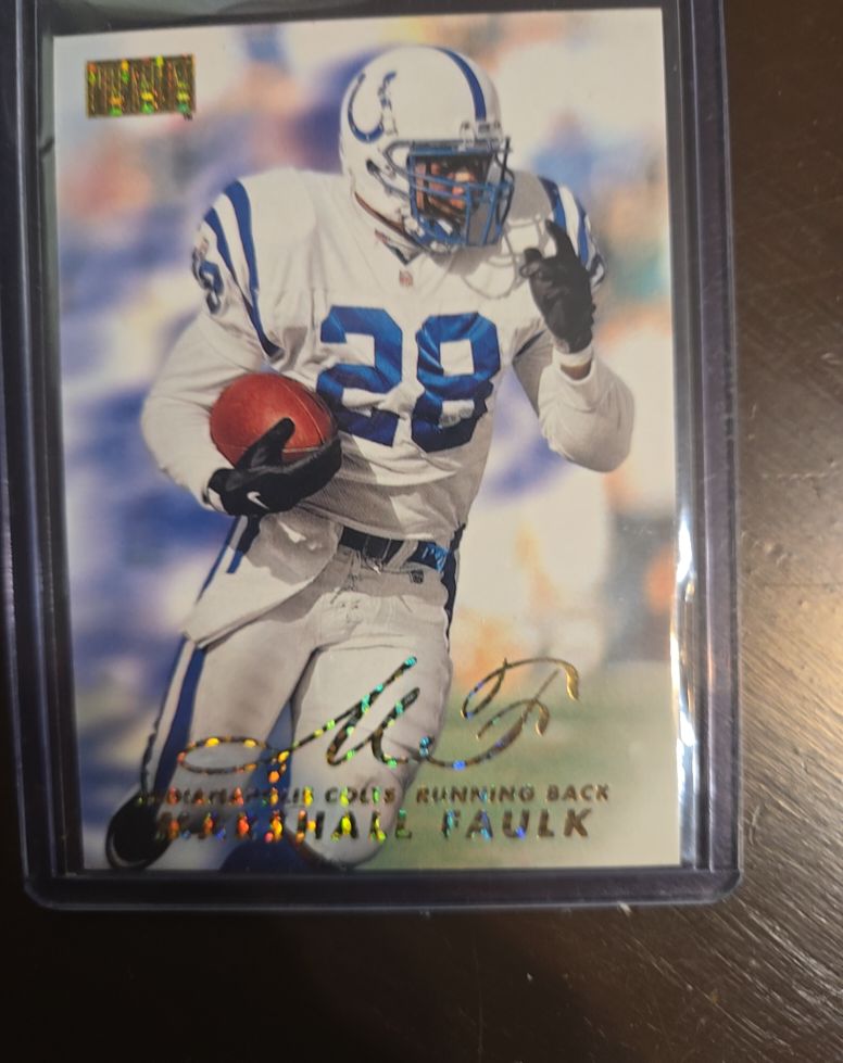 1998 SkyBox Premium #77 Marshall Faulk — front