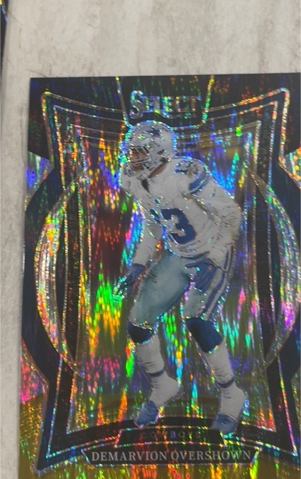 2024 Panini Select - Concourse DeMarvion Overshown #48 Red and Blue Shock Prizm Dallas Cowboys — front