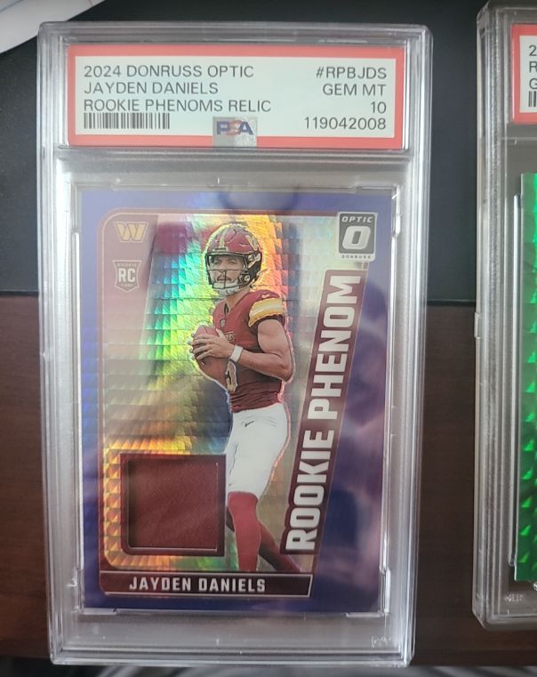 2024 Donruss Optic #RPB-JDS Jayden Daniels Rookie Phenom Relic — front