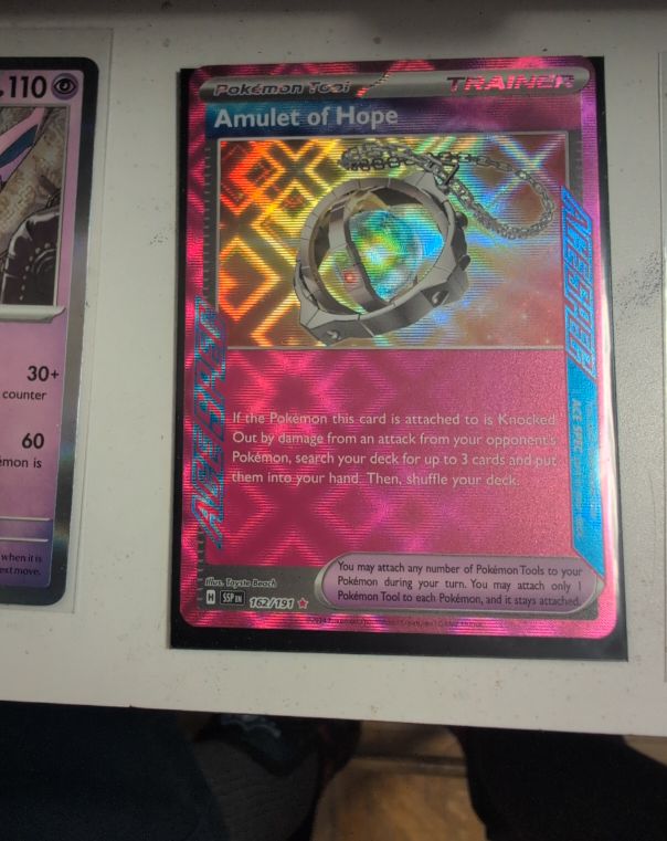 2022 Pokémon SV08: Surging Sparks #162 Amulet of Hope — front