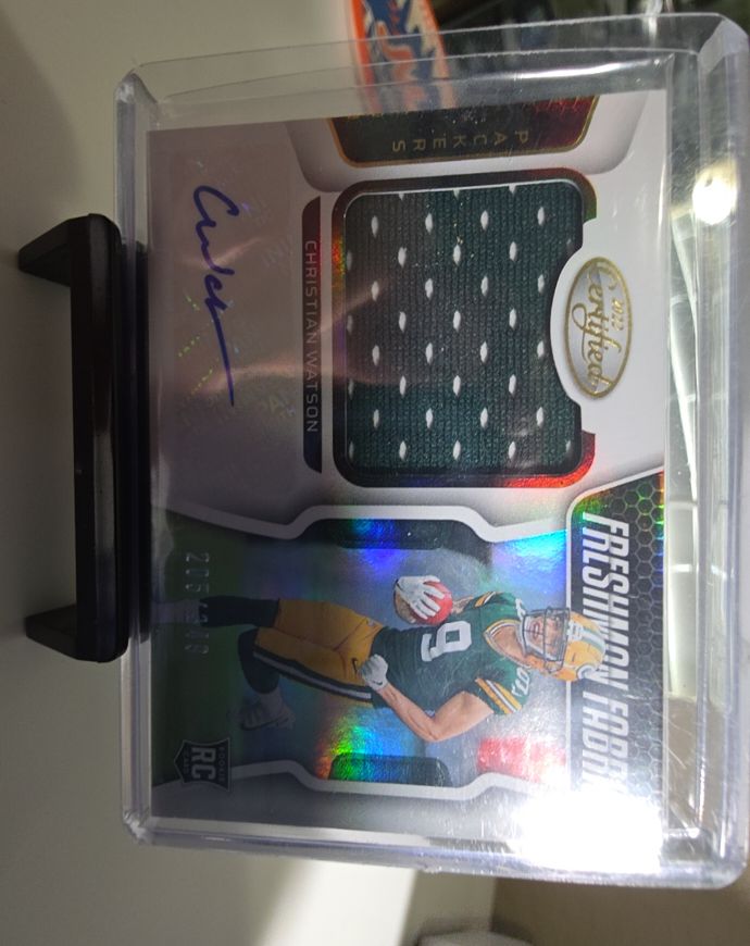 2022 Panini Certified #212 Christian Watson Freshman Fabric RPA — front