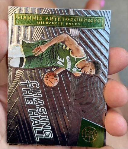2021-22 Panini Illusions #1 Giannis Antetokounmpo Chasing the Hall — front
