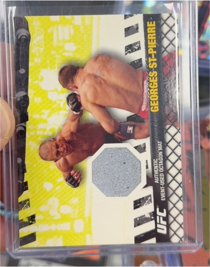2010 Topps UFC Fight Mat Relics #FM-GSP Georges St-Pierre — front