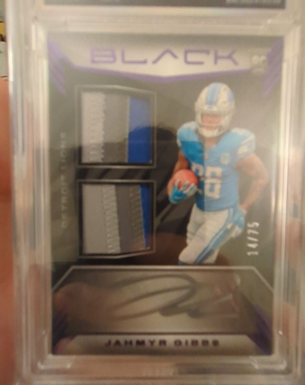 2023 Panini Black #02 Jahmyr Gibbs — front