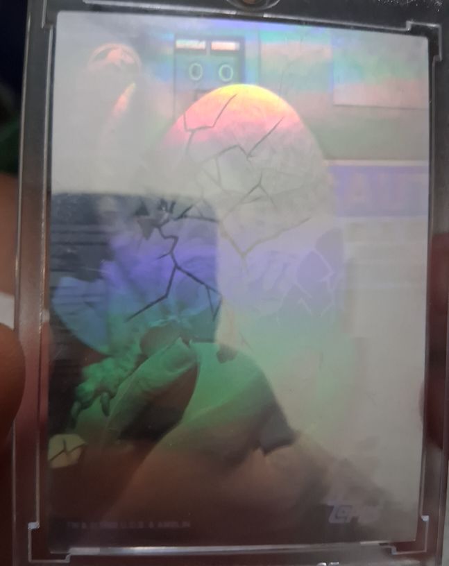 1993 Topps Jurassic Park Hologram #3 Raptor Dino Egg — front