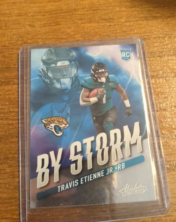 2021 Panini Absolute By Storm #BST-12 Travis Etienne Jr. — front