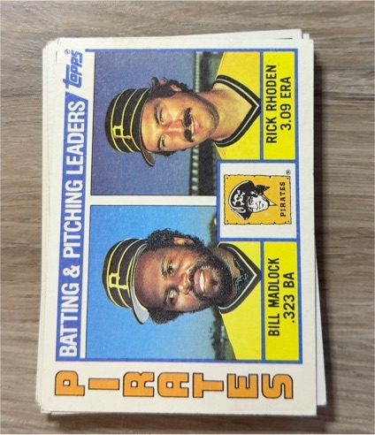 1984 Topps #696 Pirates Leaders / Checklist (Bill Madlock / Rick Rhoden) — front