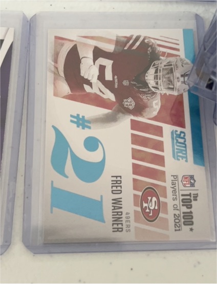 2022 Panini Score Top 100 Players of 2021 #T21 Fred Warner — front