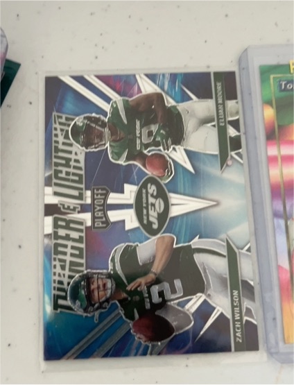 2021 Panini Playoff Thunder and Lightning #TL-18 Zach Wilson/Elijah Moore — front