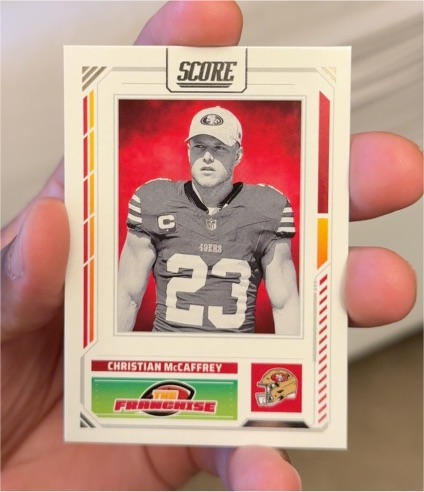 2025 Panini Score #28 Christian McCaffrey — front