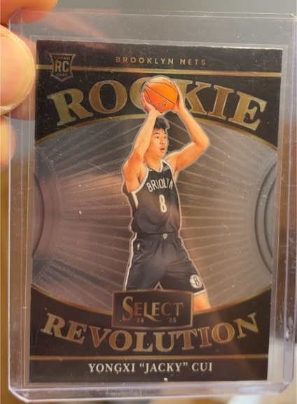 2024-25 Panini Select #19 Yongxi "Jacky" Cui Rookie Revolution — front