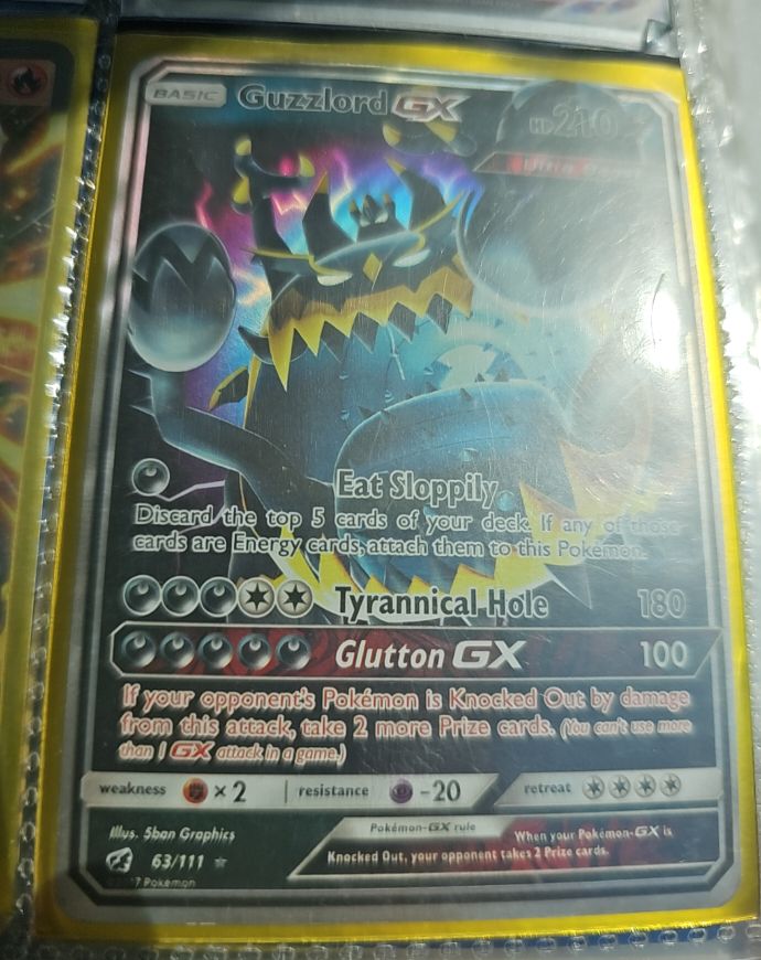 2017 Pokémon TCG Crimson Invasion #63a Guzzlord GX — front