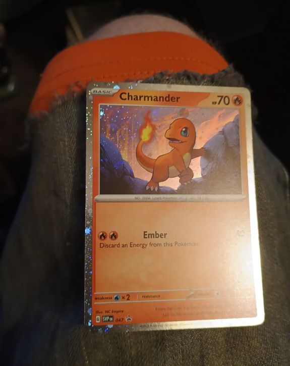 2023 Pokémon TCG Scarlet & Violet Black Star Promo #047 Charmander Cosmos Holo — front