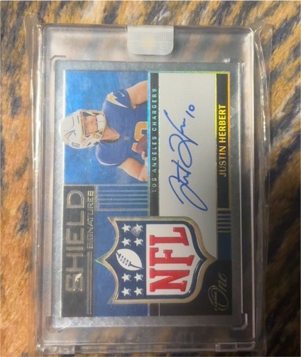 2020 Panini One NFL Shield #1 Justin Herbert — front
