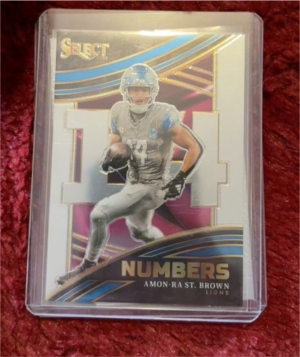 2023 Panini Select - Select Numbers #NMB-AST Amon-Ra St. Brown — front