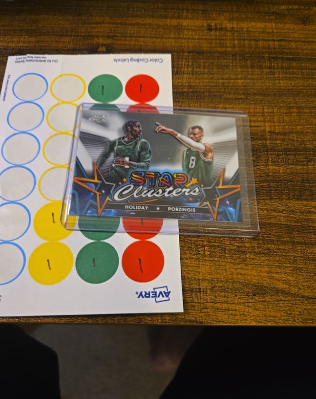 2023-24 Topps Chrome Cosmic Star Clusters #SC-2 Holiday & Porzingis — front