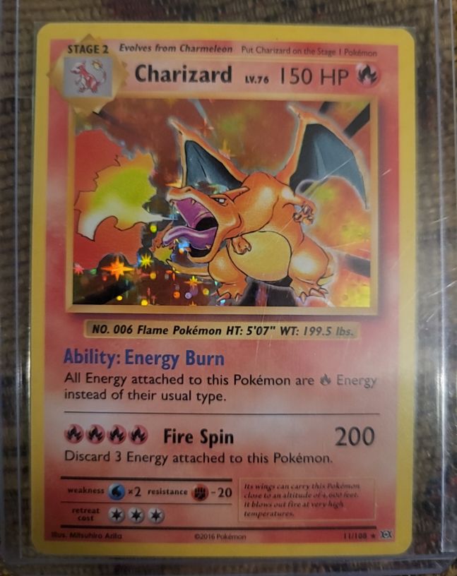2016 Pokémon XY Evolutions #11 Charizard — front
