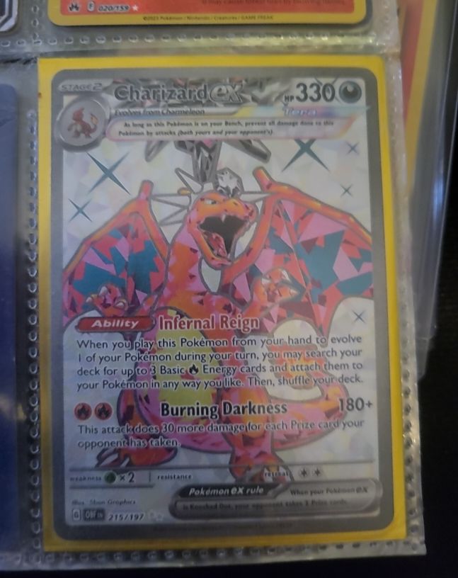 2023 Pokémon #215 Charizard ex — front