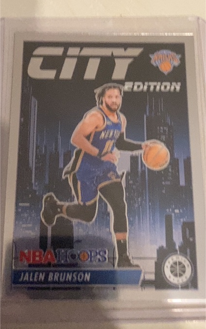 2023-24 Panini NBA Hoops Premium Stock #21 Jalen Brunson City Edition Silver Prizm — front