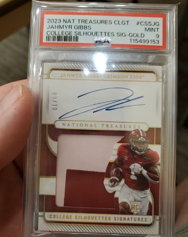 2023 Panini National Treasures College Silhouettes Signatures Gold #CSSJG Jahmyr Gibbs — front