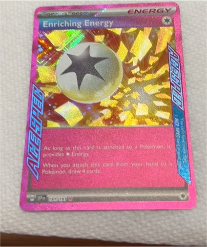 2024 Pokemon Scarlet & Violet Surging Sparks #191 Enriching Energy — front