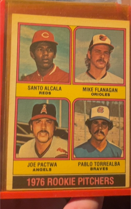 1976 Topps #589 Rookie Pitchers Santo Alcala / Mike Flanagan / Joe Pactwa / Pablo Torrealba — front