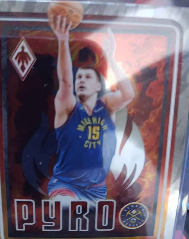 2023-24 Panini Phoenix #23 Nikola Jokic Pyro — front