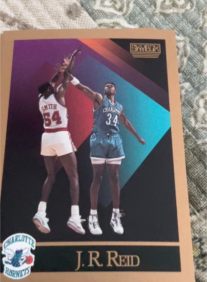 1990-91 SkyBox #32 J.R. Reid — front