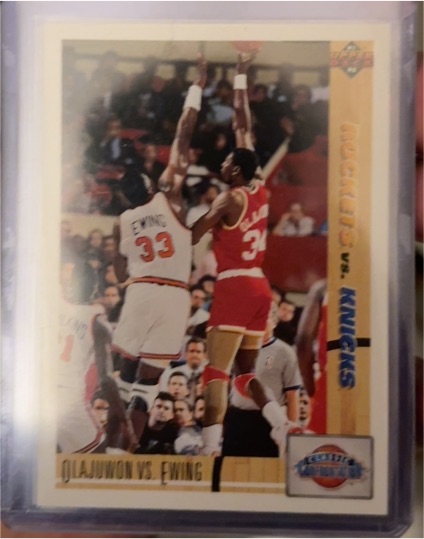 1991 Upper Deck #33 Olajuwon vs. Ewing Classic Confrontation — front