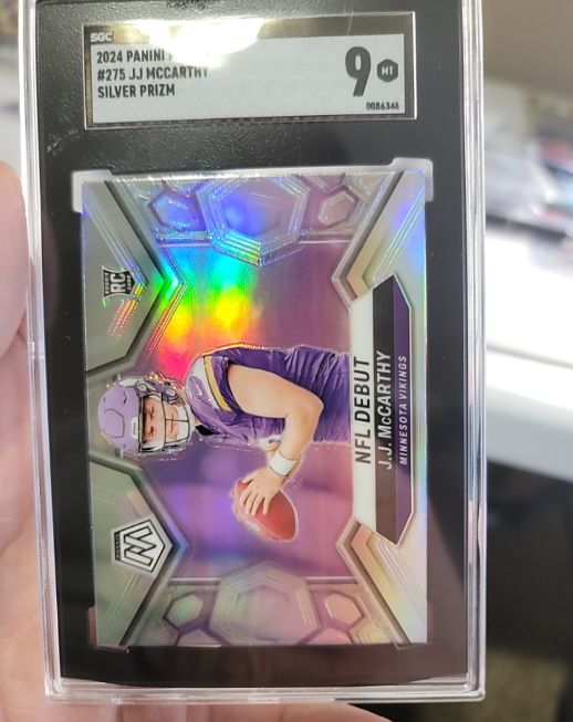 2024 Panini Mosaic #275 J.J. McCarthy NFL Debut Silver Prizm Rookie Card — front