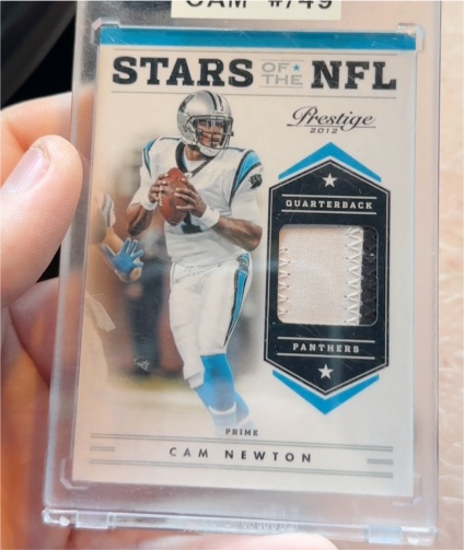 2012 Panini Prestige Stars of the NFL Materials Prime Cam Newton — front