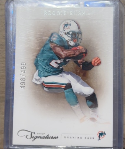 2011 Panini Prime Signatures #143 Reggie Bush — front