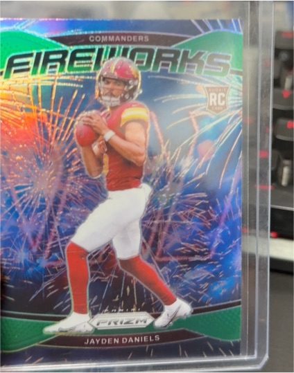 2024 Panini Prizm #24 Jayden Daniels Fireworks Green Prizm Rookie — front
