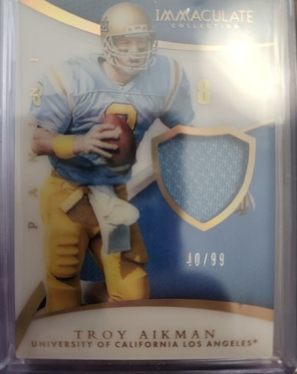 2015 Panini Immaculate Collection Troy Aikman Patch #10/99 — front