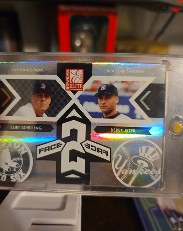 2005 Donruss Elite Face 2 Face Red #FF-10 Curt Schilling + Derek Jeter /750 — front