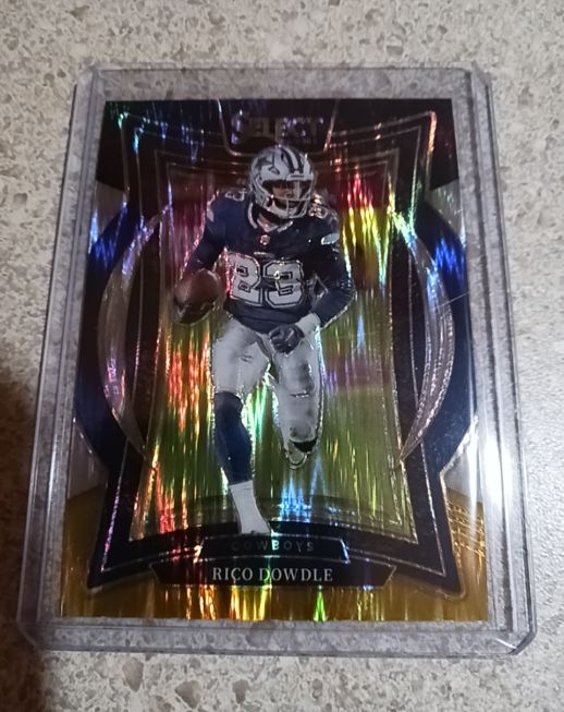 2024 Panini Select - Concourse Rico Dowdle #90 Orange Prizm Shock — front