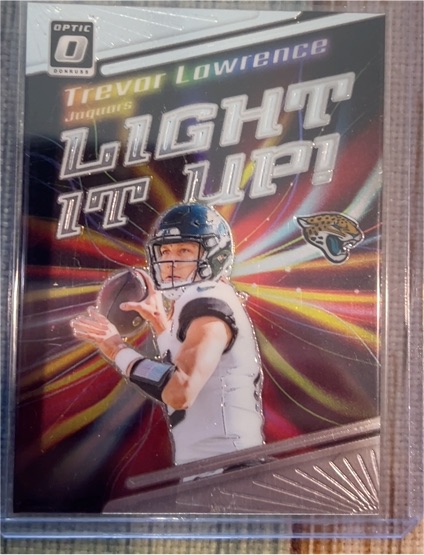 2023 Donruss Optic #LU-TL Trevor Lawrence Light It Up! Jacksonville Jaguars — front