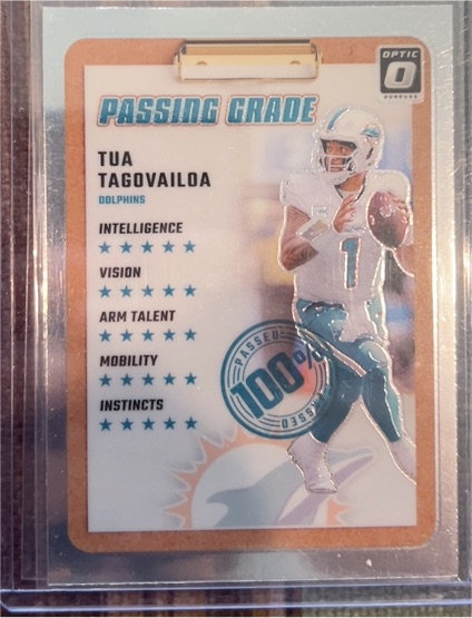 2024 Donruss Optic Passing Grade #9 Tua Tagovailoa — front